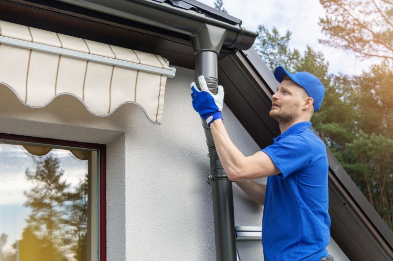 Gutter Installation Expert on Roof
